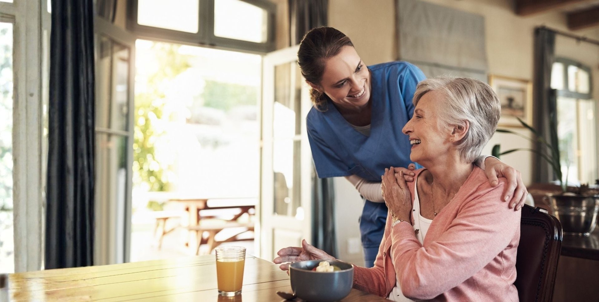 caregiver assisting senior